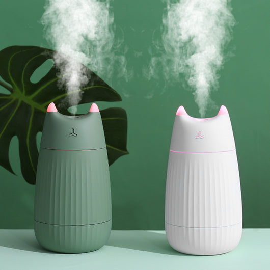 Pink cat-shaped humidifier with pointed ears and a ribbed texture on the lower body, ideal for desktop use. - Image 2