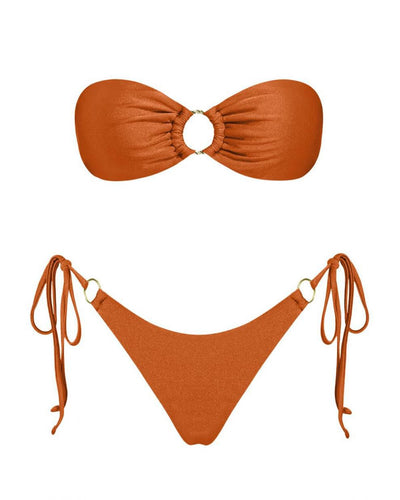 Red glitter bandeau bikini with gold-tone O-rings and side-tie bottoms on a model in a sunny outdoor setting. - Image 28