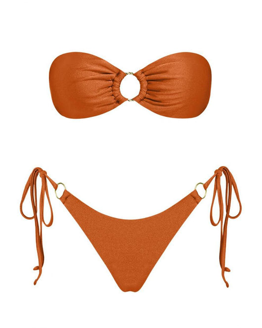Red glitter bandeau bikini with gold-tone O-rings and side-tie bottoms on a model in a sunny outdoor setting. - Image 28