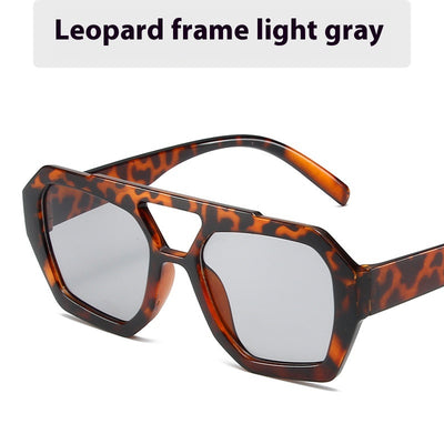 Minimalist square fashion sunglasses with a tortoiseshell frame and light brown lenses, angled view. - Image 8