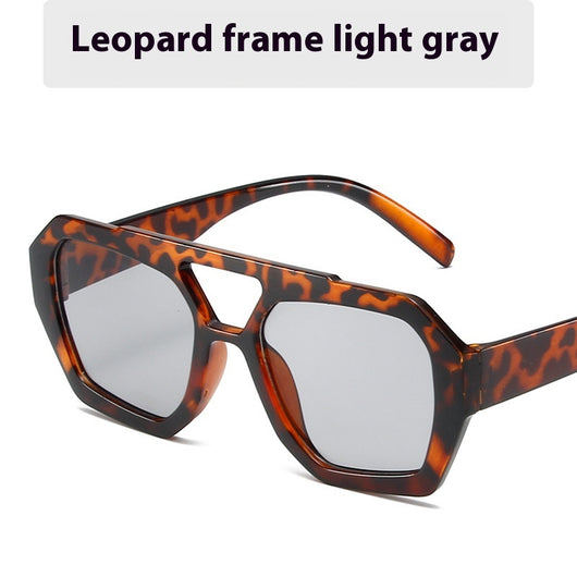 Minimalist square fashion sunglasses with a tortoiseshell frame and light brown lenses, angled view. - Image 8