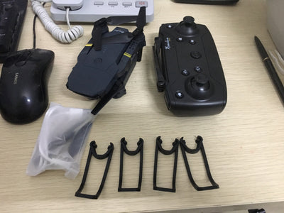 Dron Plegable E58 con Transmisión WiFi y Control Remoto de 4 Ejes - Image 4