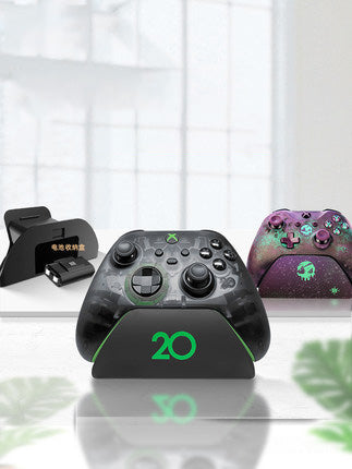 Black AOLION universal gamepad stand made of ABS plastic, designed to hold a game controller upright. - Image 5