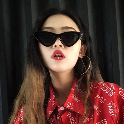 Retro cat-eye sunglasses with a tortoiseshell frame and dark lenses, ideal for a stylish, vintage look. - Image 5