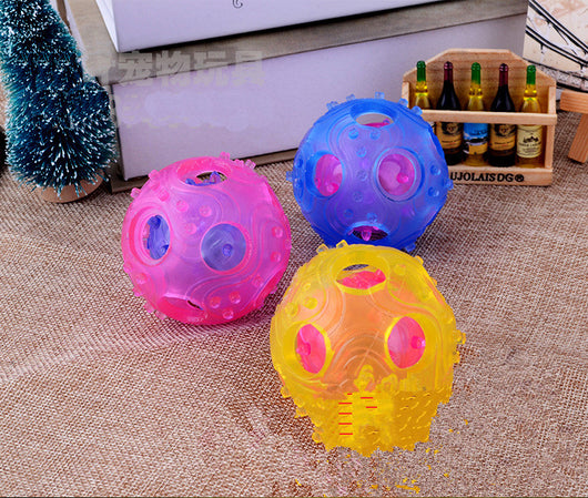 Three translucent hollow toy balls in pink, blue, and yellow, with textured surfaces and internal components. - Image 8