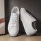 Tenis Blancos de Cuero Respirable con Suela Plana - Estilo Versátil