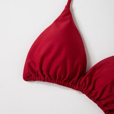 Red solid color two-piece bikini swimsuit with a halter tie-top and adjustable tie-side thong bottom. - Image 4