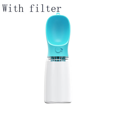 White portable pet water bottle with a clear reservoir and built-in drinking bowl, shown in a bag. - Image 11