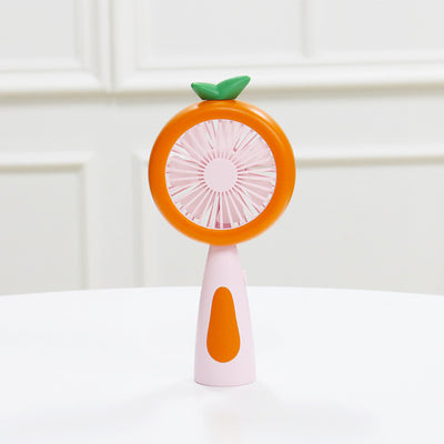 White and lime green children's handheld fan with a round head, small leaf accent, and fruit-like design. - Image 6