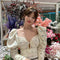 Blusa Elegante de Encaje con Mangas Abullonadas Estampado Floral