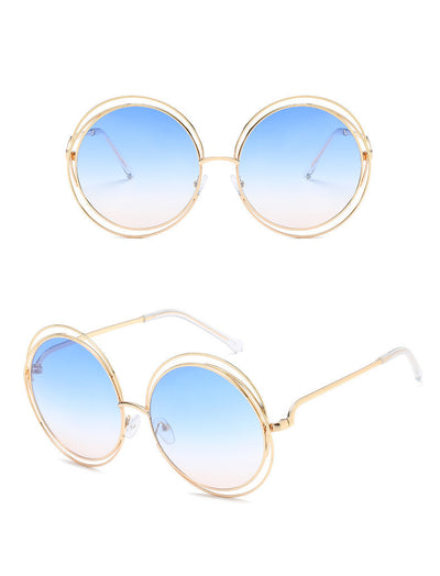 Round metal cutout sunglasses with silver mirrored lenses and a double-rimmed frame, shown from front and angled views. - Image 6