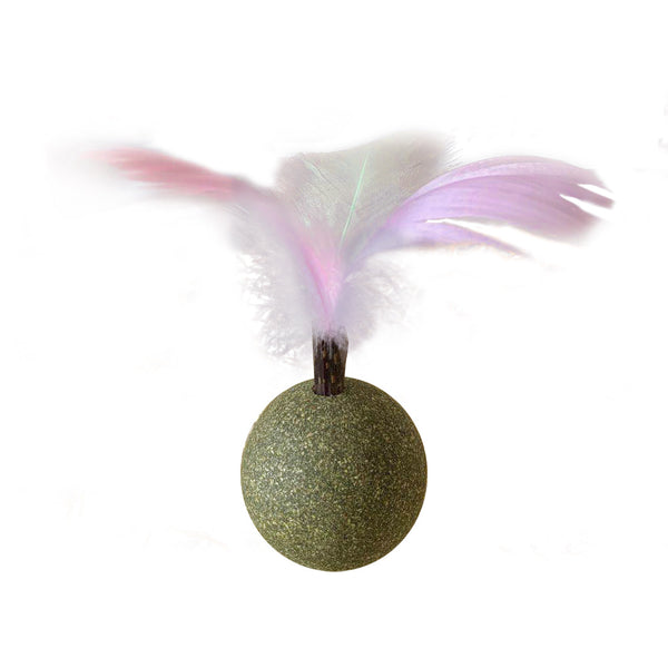 Green catnip ball toy with pink, purple, and white feathers attached, designed for cats to play and nibble.