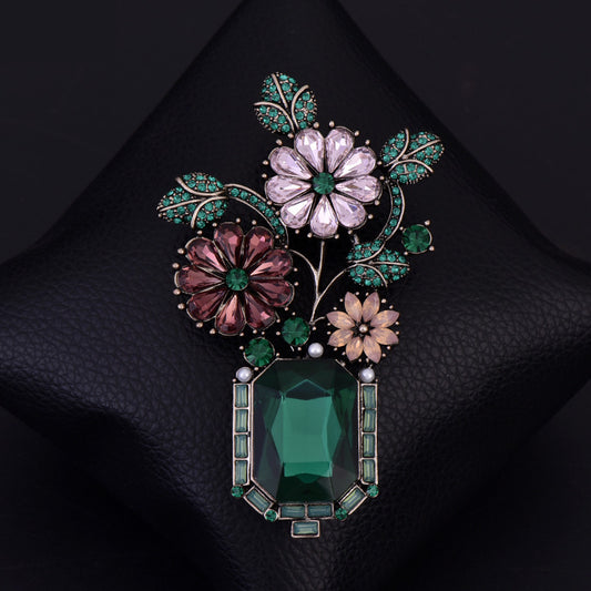 Broche Vintage Floral con Cristales de Imitación - Diseño Dorado y Verde