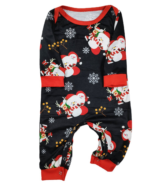 Woman wearing a black and red Christmas pajama set with a Santa Claus graphic top and snowman-patterned pants. - Image 4