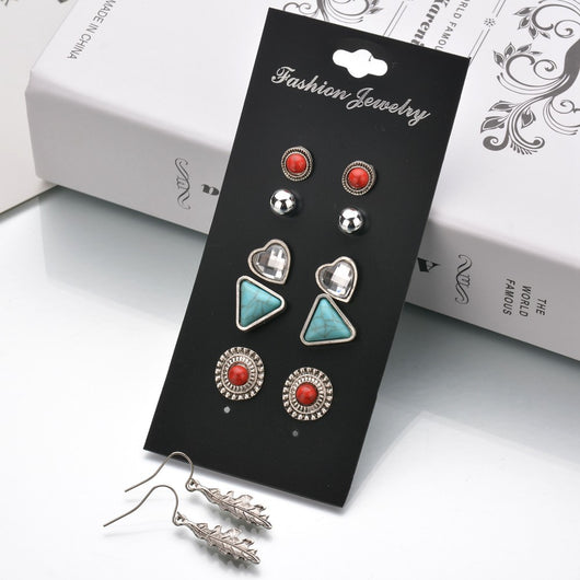 Aretes de Cristal Transparente con Dije Geométrico de Formas Antiguas