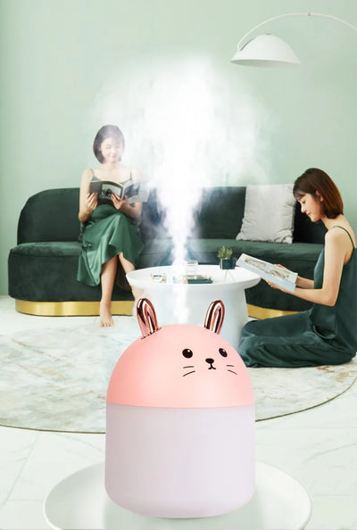 Cute sky blue and white mini USB rabbit humidifier with gold ears, ideal for home or office aromatherapy. - Image 13
