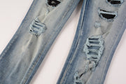 Jeans Slim Fit Azul con Pliegues, Detalles de Piel de Serpiente y Rotos Bordados - Image 5