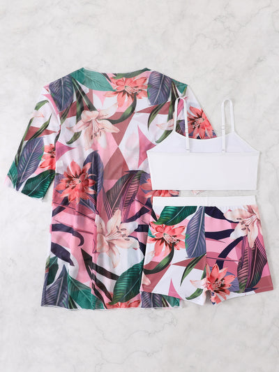 Woman in a three-piece bikini swimsuit set with a black tube top, floral boy shorts, and a sheer floral kimono cover-up. - Image 51