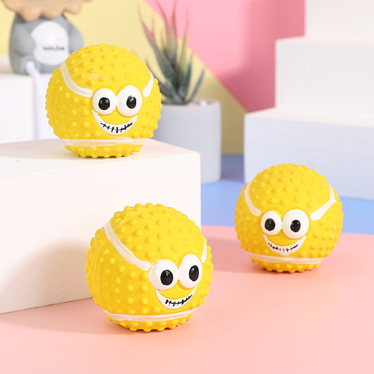 Yellow textured latex pet ball with a cartoon face, designed as a sounding dog toy for teeth cleaning. - Image 10