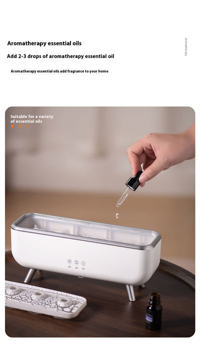 White rectangular ultrasonic humidifier with a textured top, silver legs, and control icons for mist, rotation, and light. - Image 11