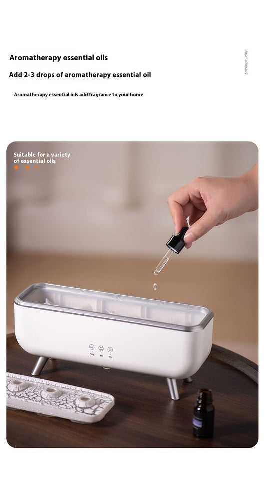 White rectangular ultrasonic humidifier with a textured top, silver legs, and control icons for mist, rotation, and light. - Image 11