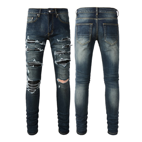 Jeans Azules Rotos con Parches de Cuero - Estilo Urbano de Alta Moda