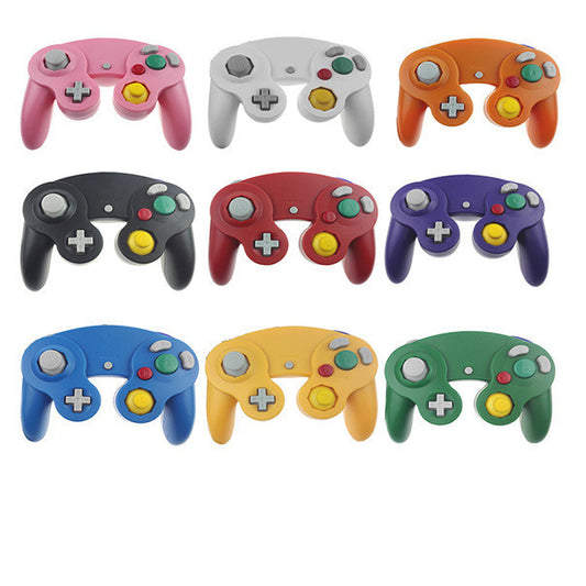 White wired game controller for NGC console with gray D-pad, analog sticks, and colored face buttons.