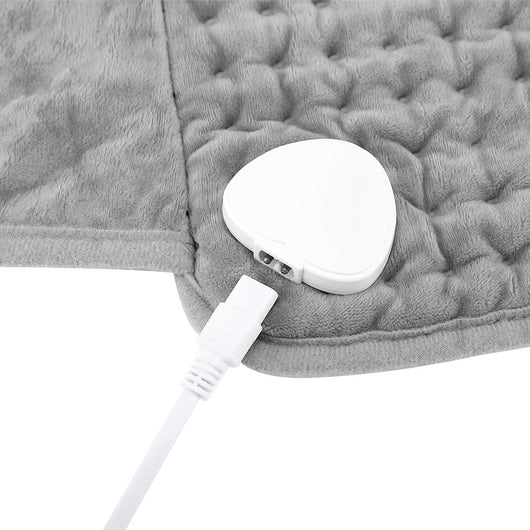 Gray quilted waist heating belt with an adjustable strap, wired remote control, and power plug, shown with its box. - Image 8