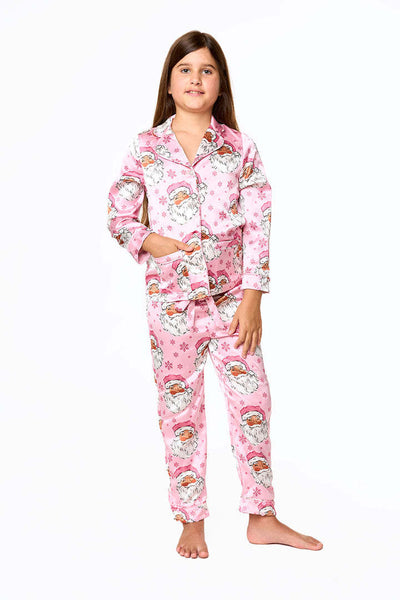 Young girl in a leopard print pajama set with black feather trim on the cuffs and ankles, wearing a pink glitter headband. - Image 6