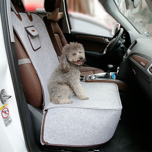 Light grey pet car seat with brown trim on a car's front passenger seat, holding two small dogs. Includes a black pet seatbelt tether. - Image 13