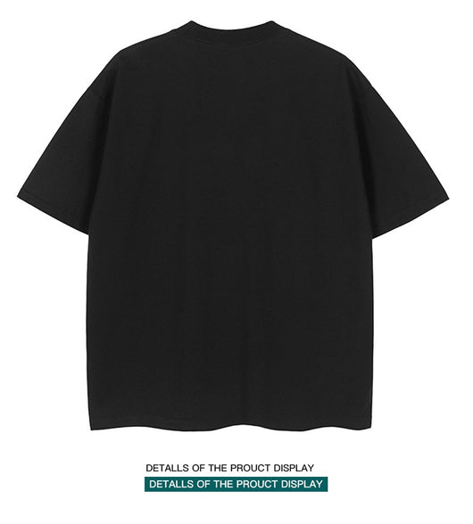Moss green short-sleeve cotton t-shirt with a crew neck and a relaxed, oversized fit. - Image 20
