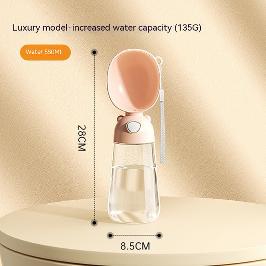 Yellow portable pet water bottle with clear reservoir, built-in drinking bowl, and wrist strap, 28cm tall. - Image 13