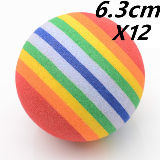 Rainbow striped foam pet toy ball, 6.3cm in diameter, with diagonal bands of red, orange, yellow, green, and blue. - Image 6