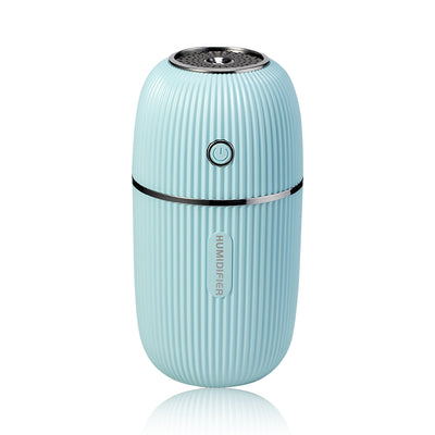 Navy blue portable humidifier with a ribbed texture, silver accents, and a power button on a white background. - Image 13