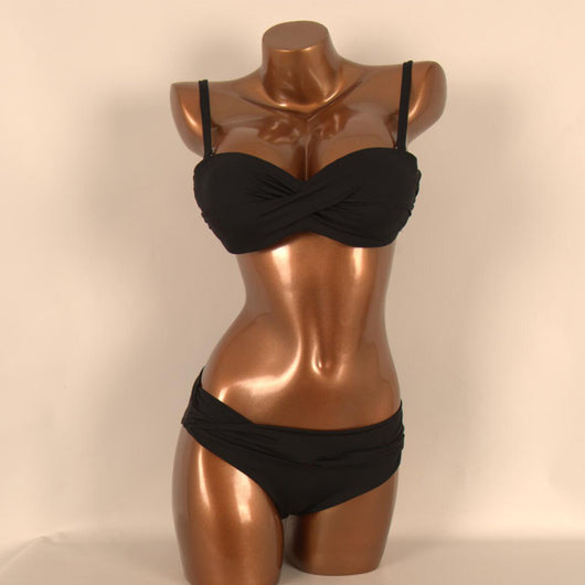 Red two-piece bikini with a twisted bandeau top and ruched low-rise bottoms, displayed on a mannequin. - Image 5