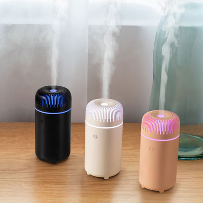 White columnar tabletop water humidifier with a ribbed top and a power button on the front, on a white background. - Image 11