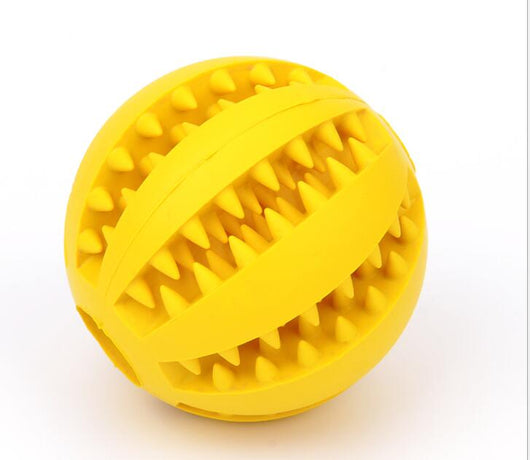 Bright green rubber pet toy ball with textured spikes and ridges for dental cleaning and food dispensing. - Image 8