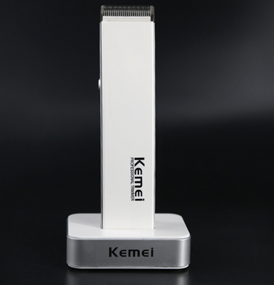 White and silver Kemei Professional Trimmer electric hair clipper with charging base. - Image 4