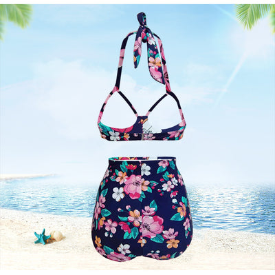Navy blue floral high-waisted bikini with a halter top and front tie knot, featuring pink, orange, and white flowers. - Image 7