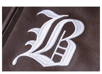 Chaqueta de Cuero con Patchwork Contrastante y Detalles Bordados - Image 22