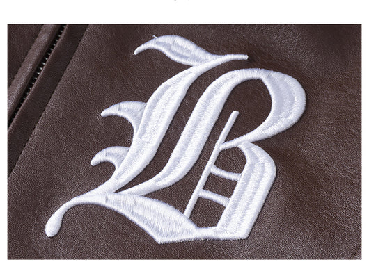 Chaqueta de Cuero con Patchwork Contrastante y Detalles Bordados - Image 22