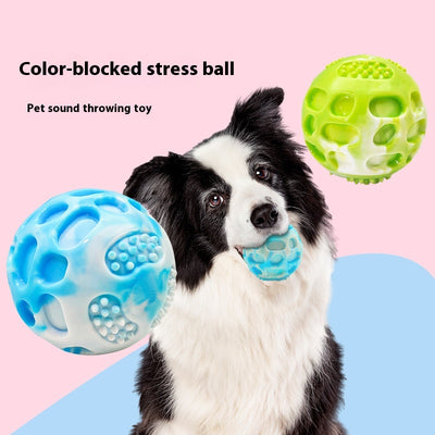 Blue and white marbled rubber dog toy ball with textured nubs and hollows, approximately 6cm in diameter. - Image 2