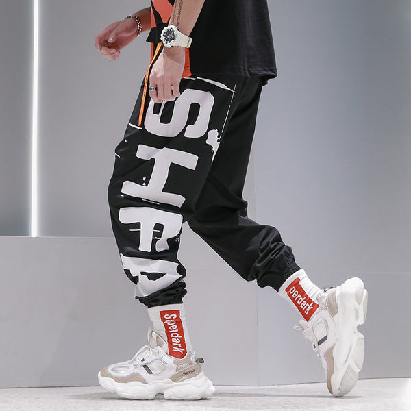 Pantalones Harem Sueltos con Estampado - Diseño Moderno y Cómodo