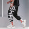 Pantalones Harem Sueltos con Estampado - Diseño Moderno y Cómodo