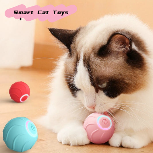 Red smart cat toy rolling ball with textured surface and glowing power button, designed for interactive play.