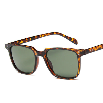 Classic retro midin sunglasses with a black and white striped frame and dark square lenses. - Image 10