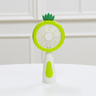 White and lime green children's handheld fan with a round head, small leaf accent, and fruit-like design. - Image 7