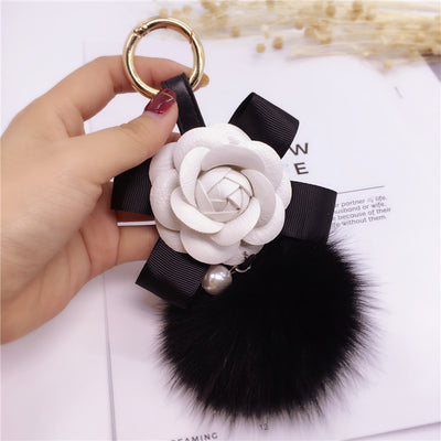 Llavero Decorativo Flor Camelia con Moño para Bolsa de Mujer - Image 9