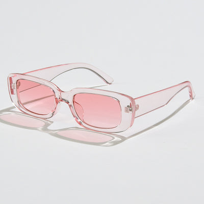 Rectangular tortoiseshell sunglasses with a small frame and dark gray lenses, angled on a white background. - Image 46