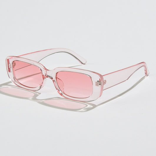 Rectangular tortoiseshell sunglasses with a small frame and dark gray lenses, angled on a white background. - Image 46